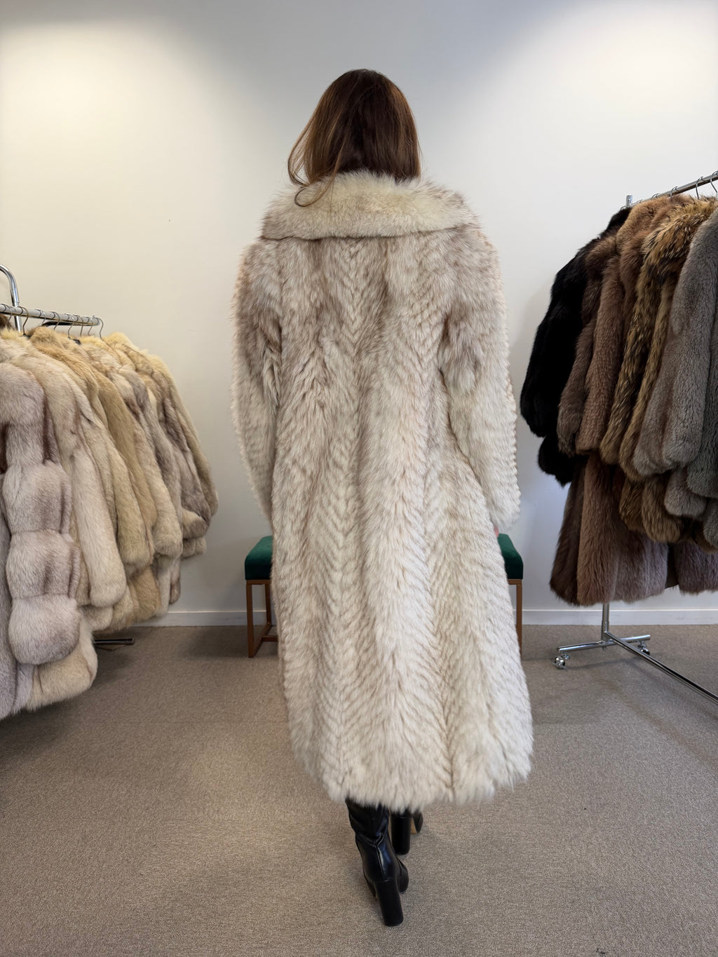 Full-length white Nordic fox fur coat, front view with hands together