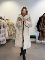 Back view of white Nordic fox fur coat, full length