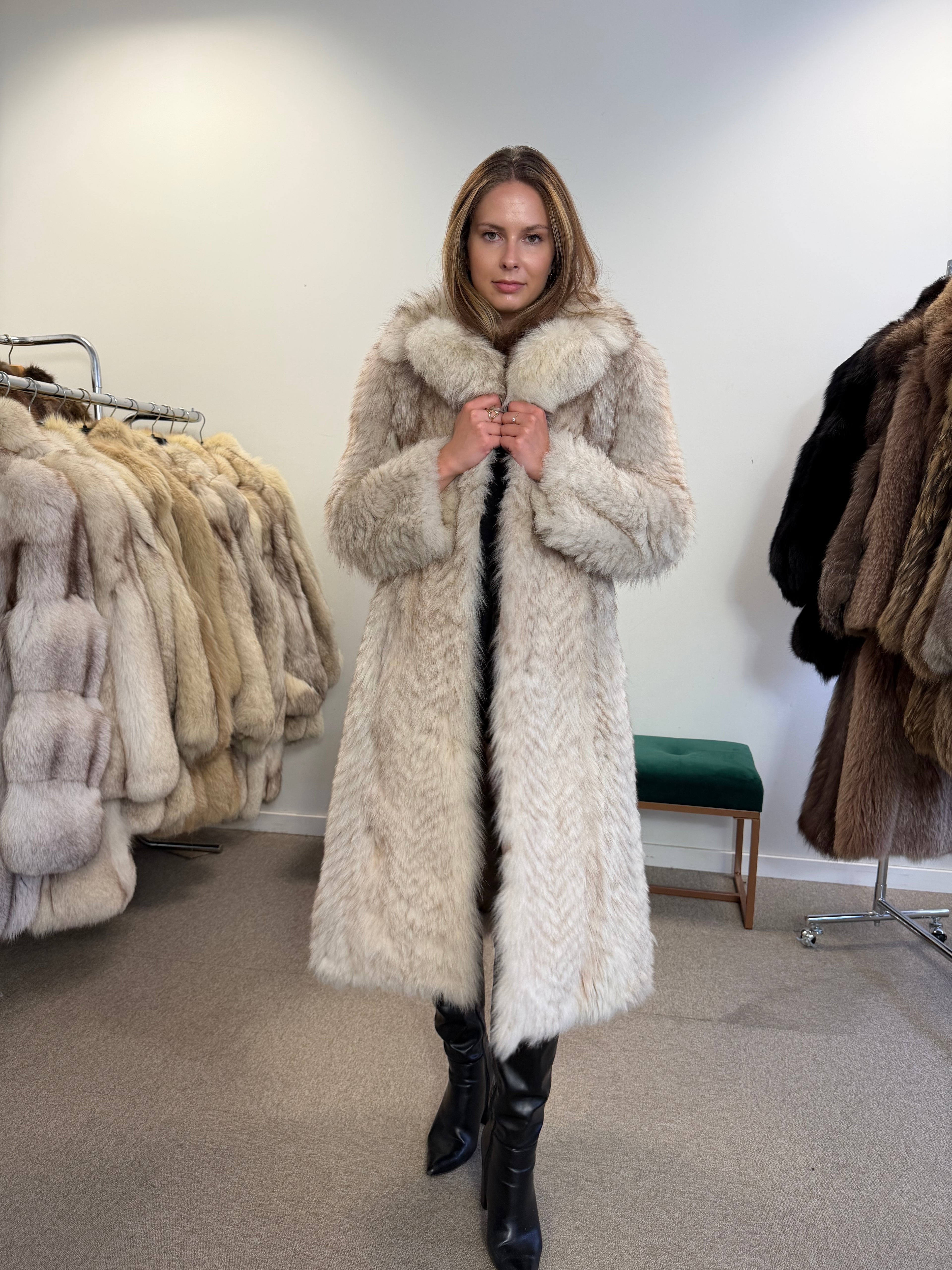 Back view of white Nordic fox fur coat, full length
