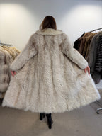 Back view of white Nordic fox fur coat, fabric spread wide