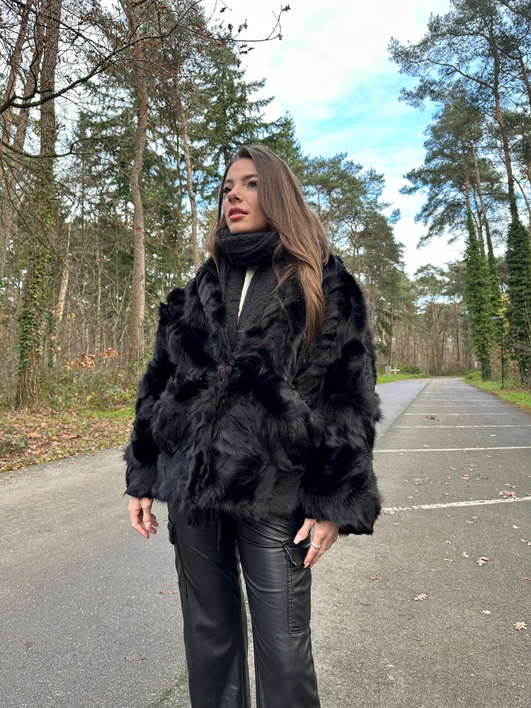 Back view of real black fox fur jacket, women’s large size, vintage full-fur design.
