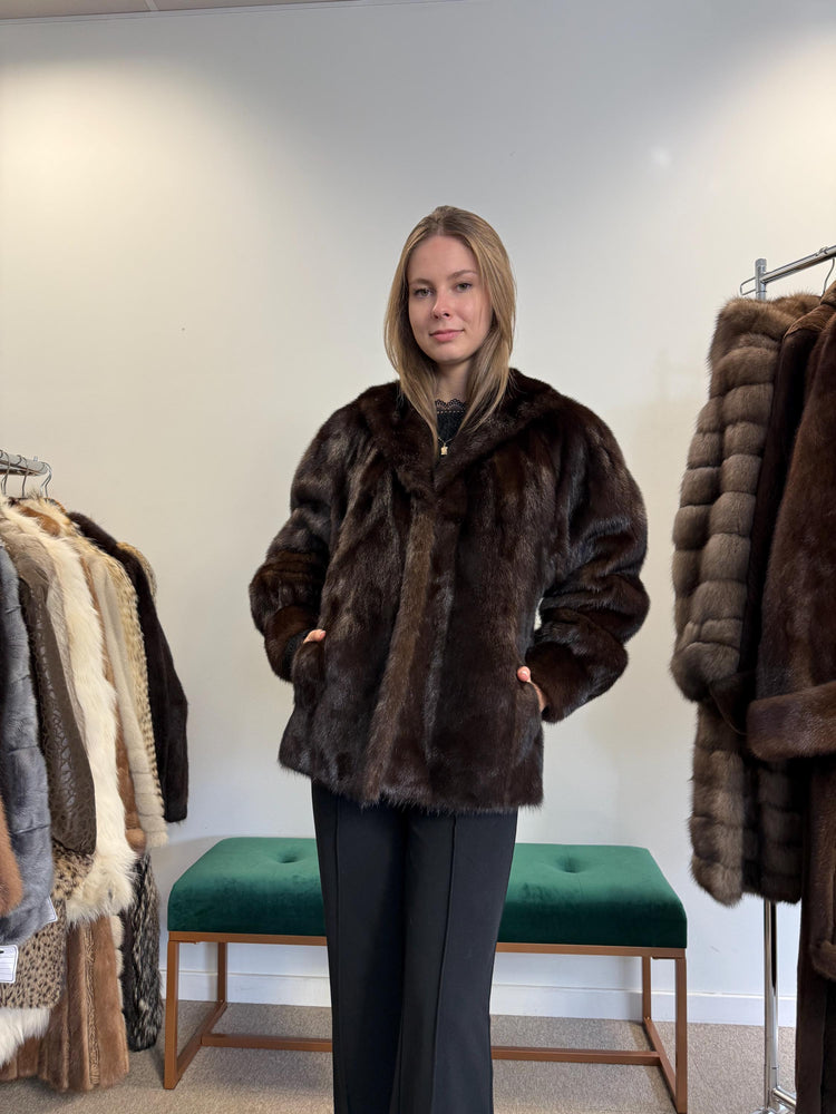Back view of real brown mink fur jacket, women’s medium, short-length vintage style.