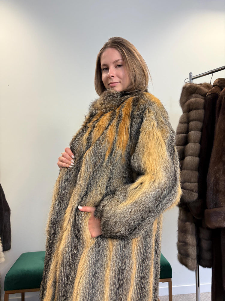 Shoulder and sleeve detail of grey fox fur coat, women’s large, soft fluffy real fur.