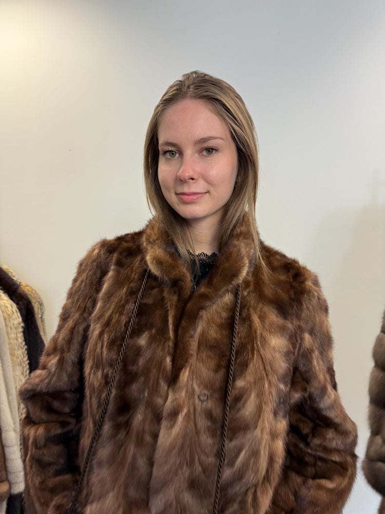 Side view of light brown mink jacket, women’s XL, soft thick real vintage fur.