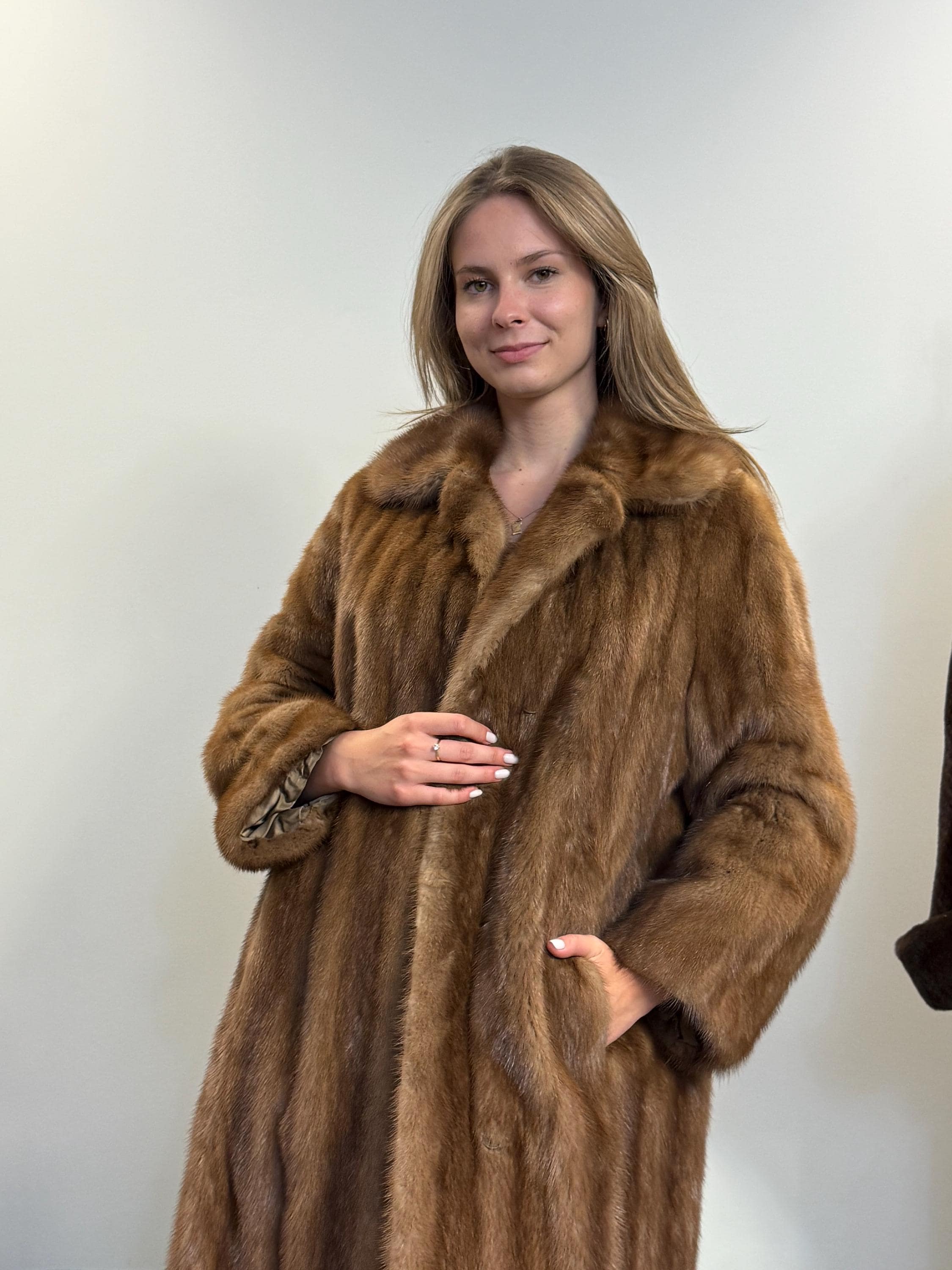 Long pastel brown mink coat, real fur, women’s large size, soft and thick, front view.