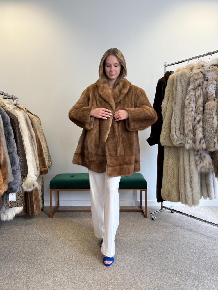 Light pastel brown mink fur coat, XXL women’s size, elegant vintage outerwear side view.