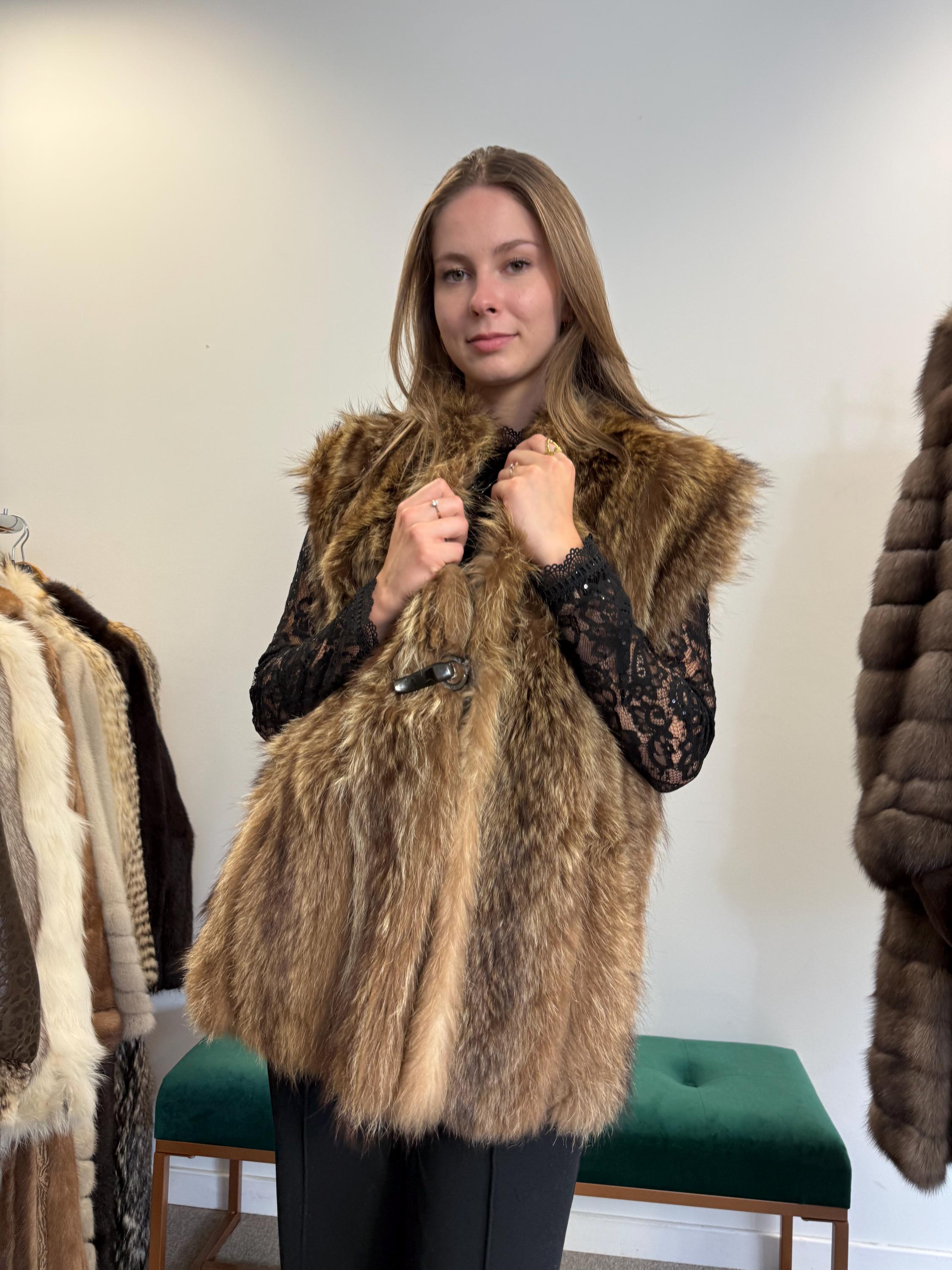 Side view of brown raccoon fur vest, large size, soft fluffy real fur, vintage women’s vest.