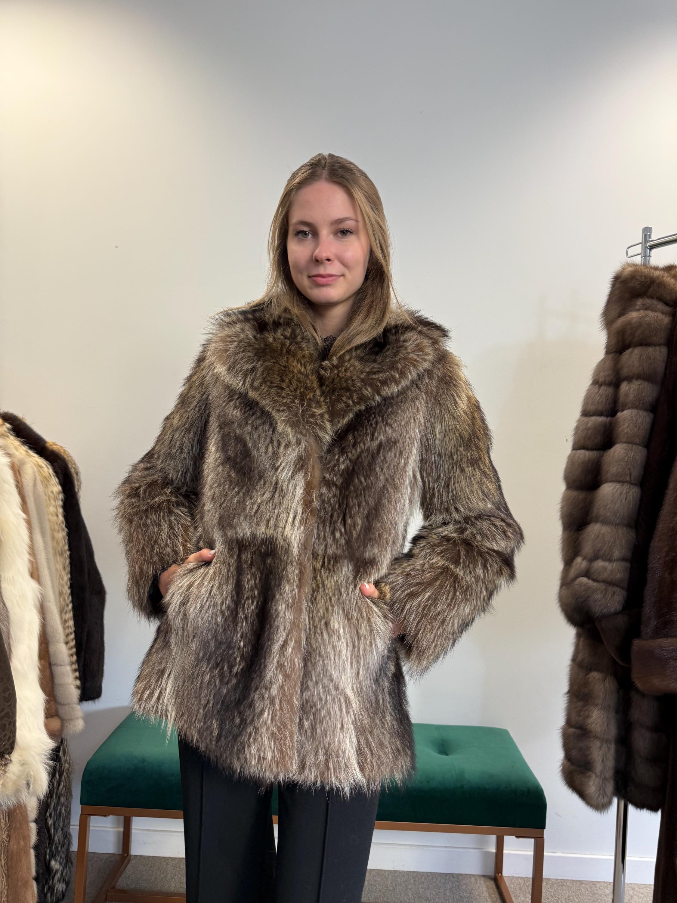 Raccoon fur jacket, women’s vintage outerwear, soft real fur, front view.