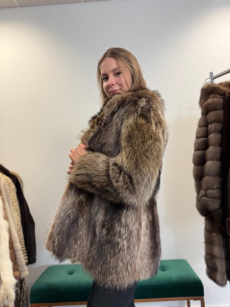 Interior lining detail of raccoon fur jacket, vintage style, high-quality real fur.