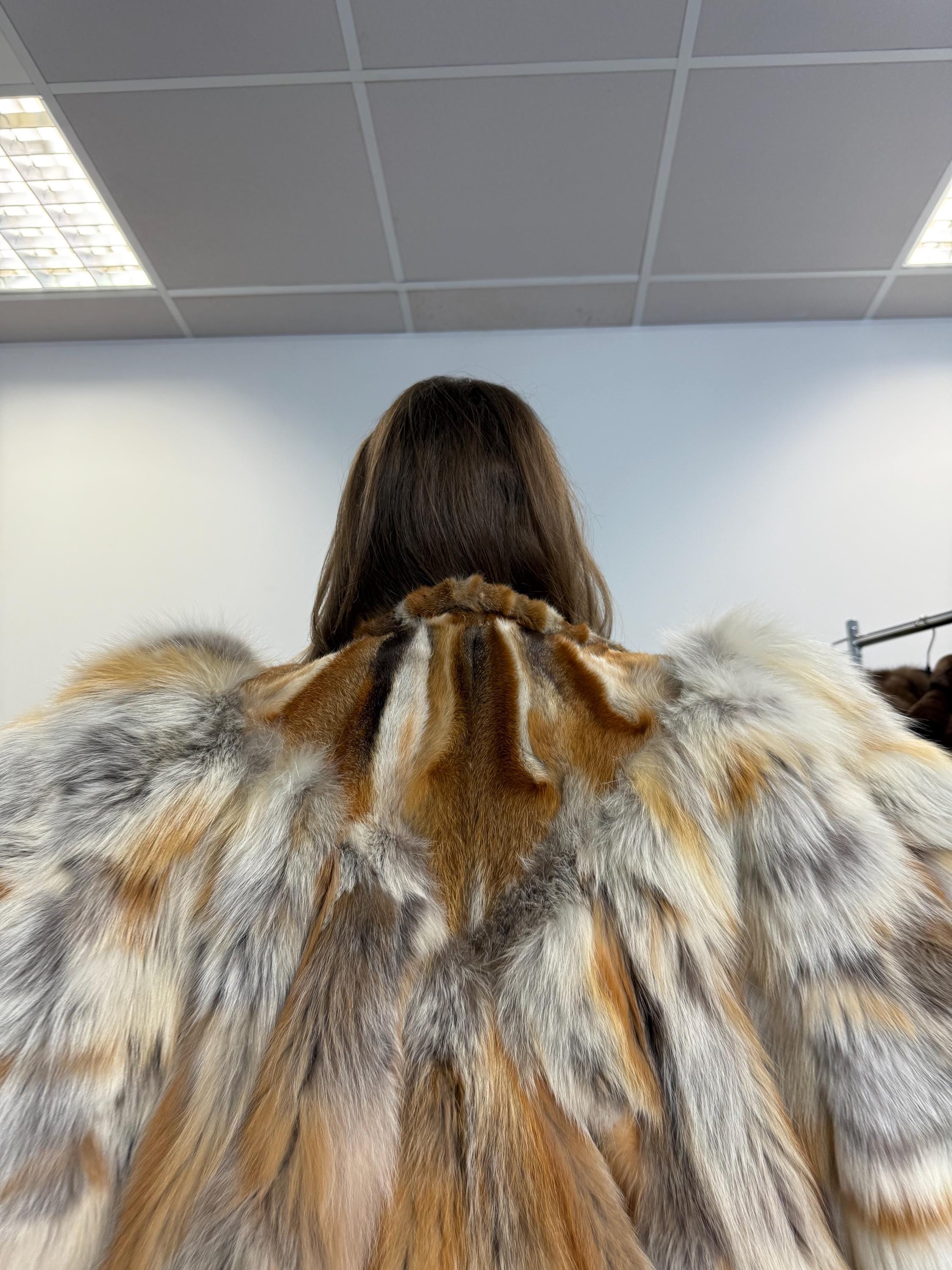 Close-up of soft red fox fur, women’s large vintage jacket, high-quality short fur.