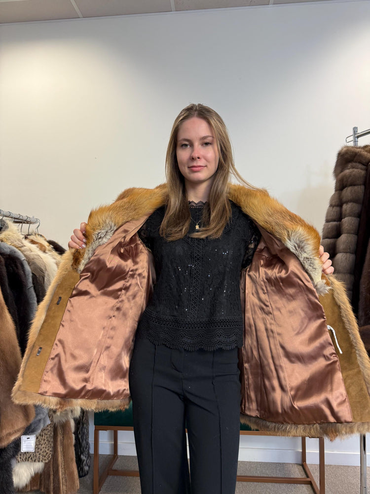 Real red fox fur jacket, women’s vintage coat, soft fur, front view.