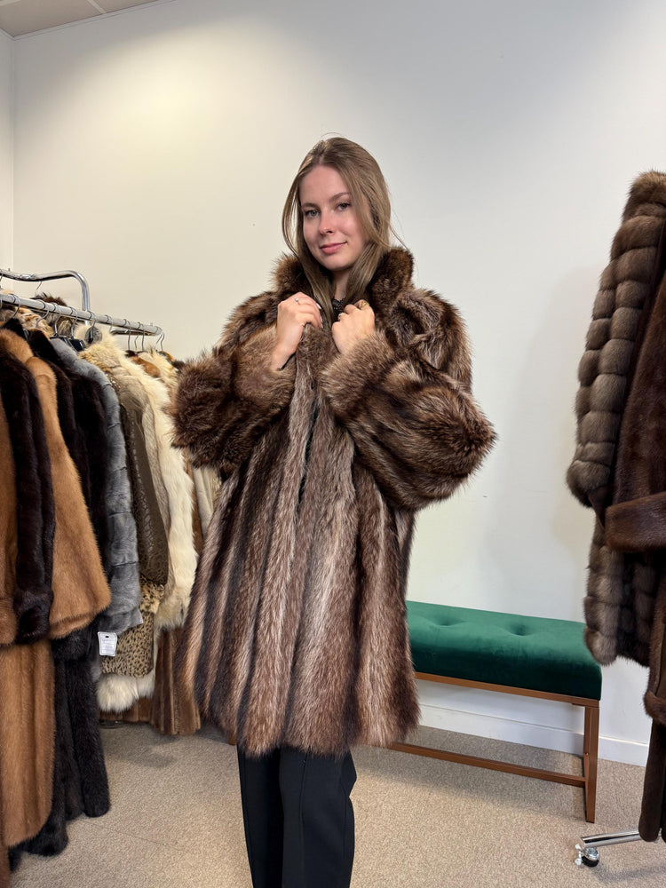 Rare raccoon fur coat in natural colour, extra large size, soft vintage fur side view.
